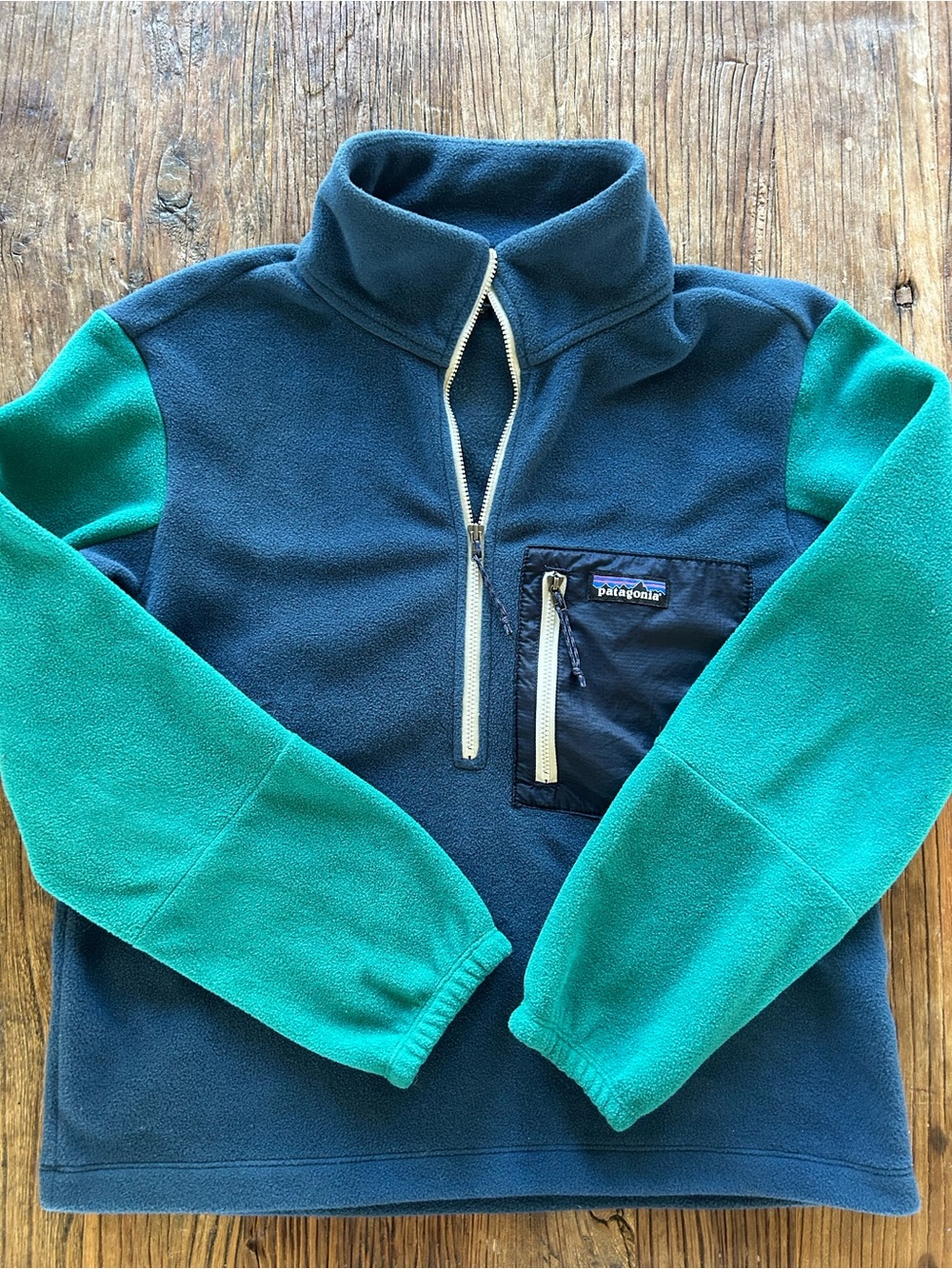 Patagonia Women’s Navy Body with Teal Sleeves Half-Zip Fleece